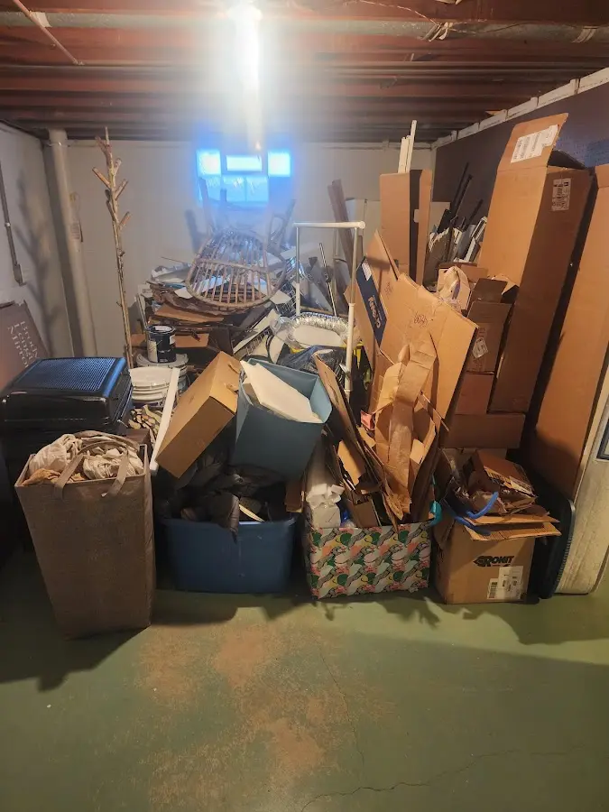 Roll-off dumpster container at job site for 2 Yard Dumpster Rental in Orange City